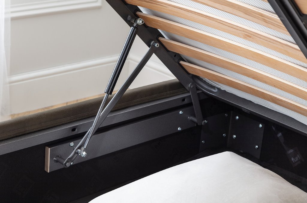 Built-in drawers slide out from the sides or foot of the bed.